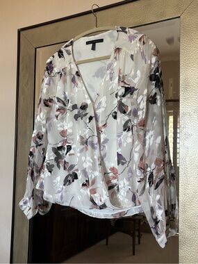 White House Black Market (WHBM) floral burnout wrap-style blouse.